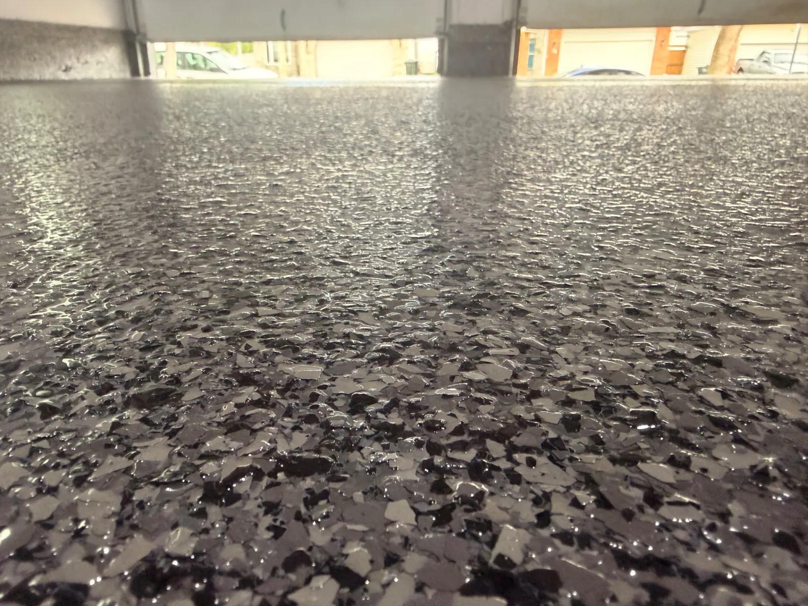 Darkside flake floor viewed toward the open garage door