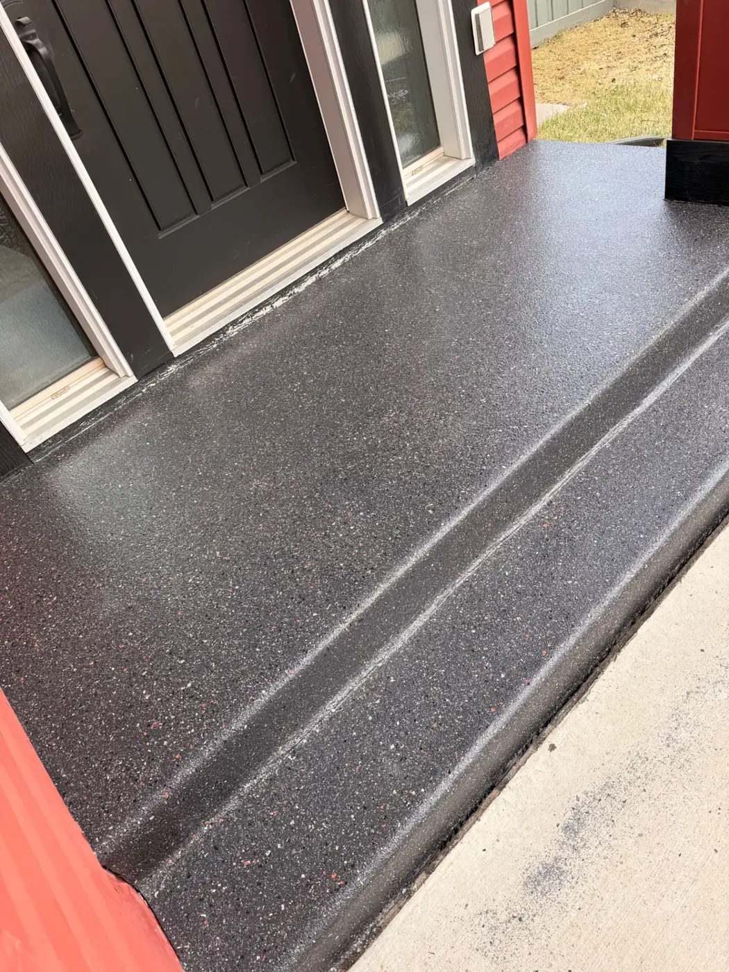 Exterior front step, dark flake