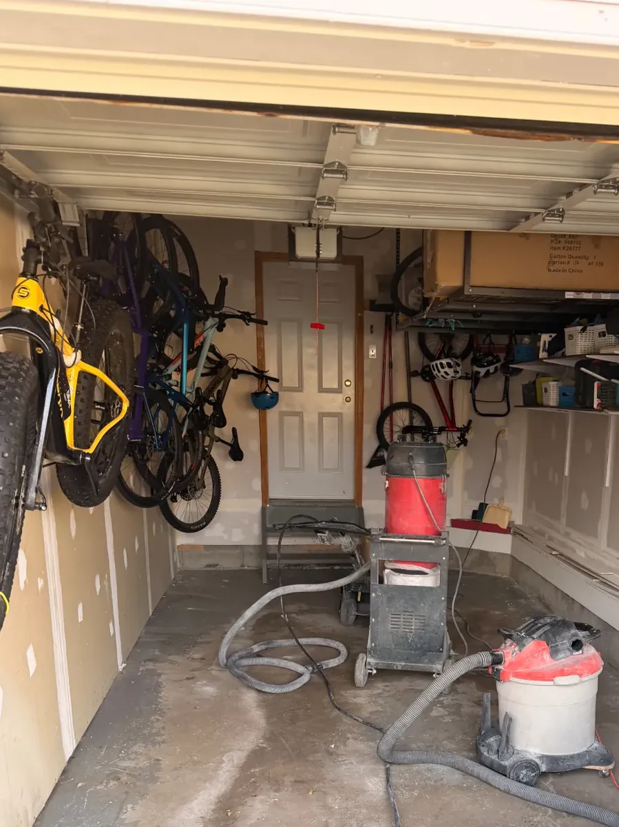 Single garage with bare concrete before grinding