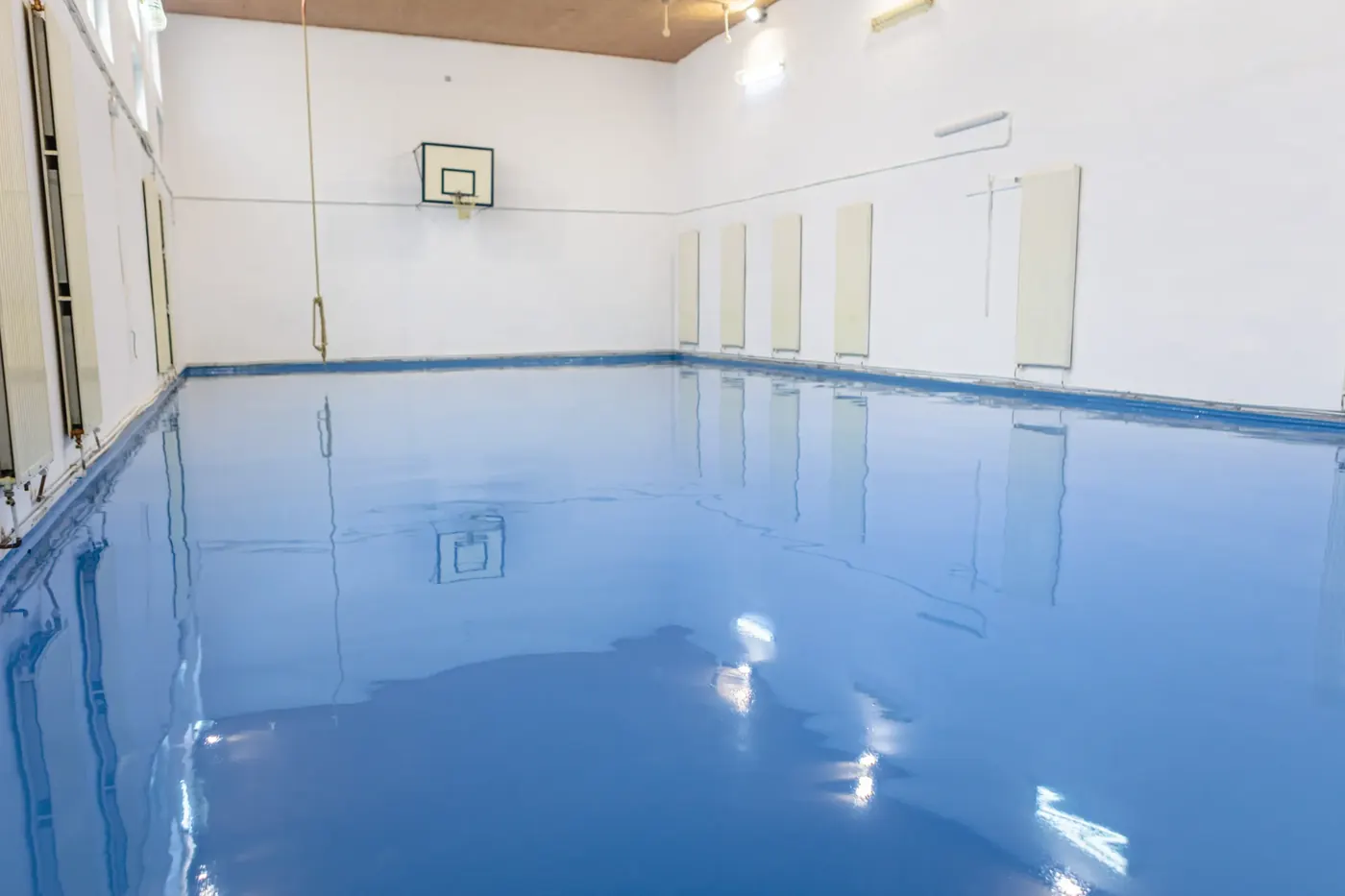 Reference: Blue solid-colour gymnasium floor