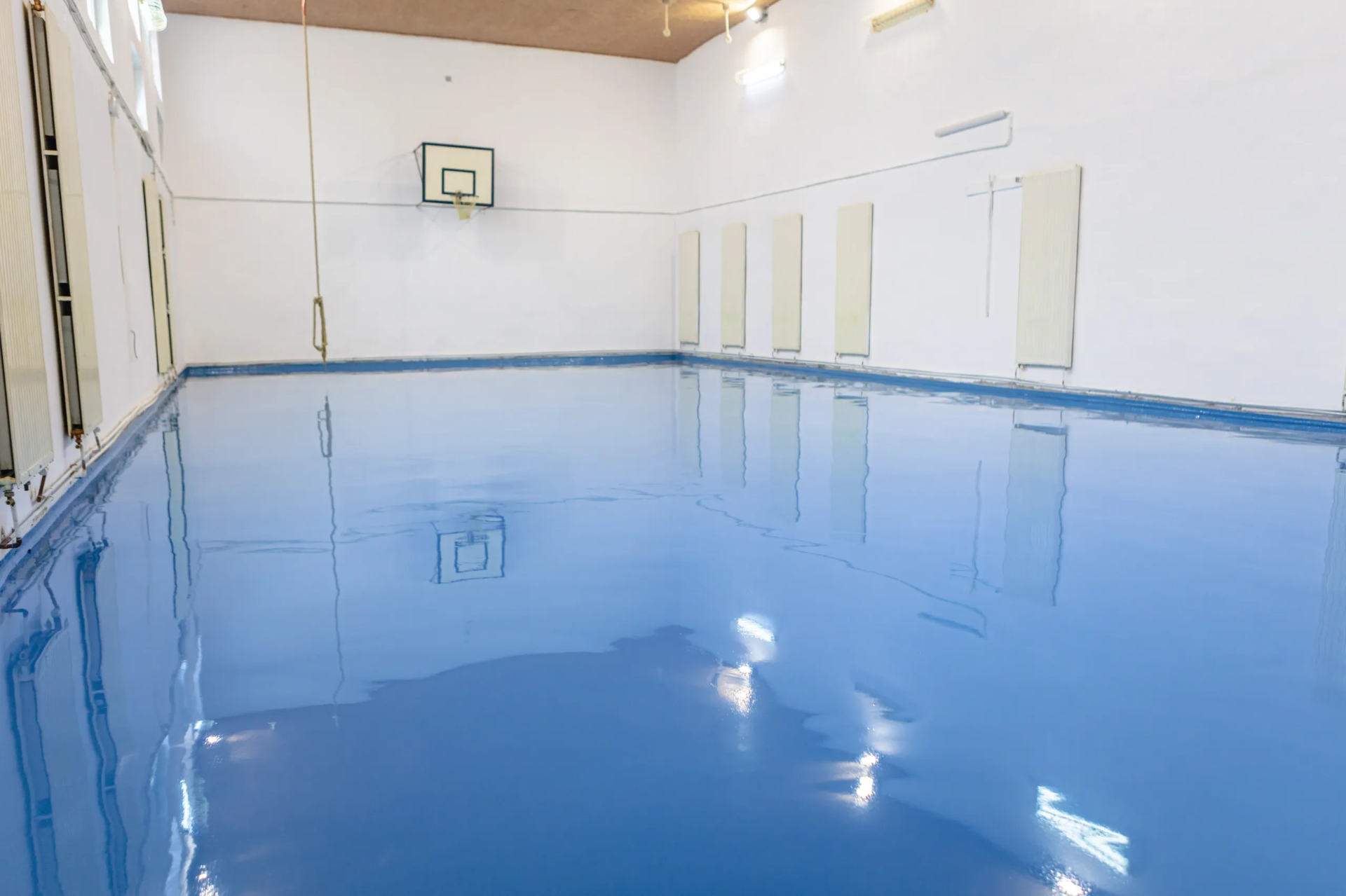Blue solid epoxy gymnasium floor