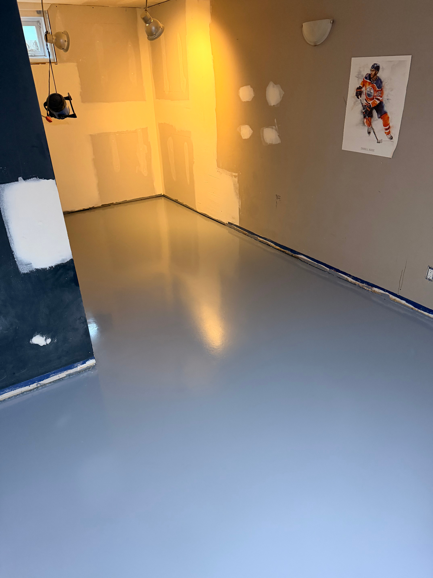 Solid color epoxy basement floor